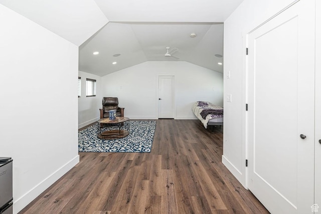 1959 E Deer Crest Cir N, Logan, UT 84341 - interior space featuring baseboards, wood finished floors, a ceiling fan, and vaulted ceiling
