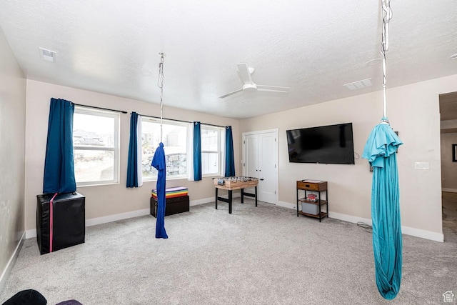 1959 E Deer Crest Cir N, Logan, UT 84341 - playroom featuring a ceiling fan, baseboards, a textured ceiling, and carpet flooring