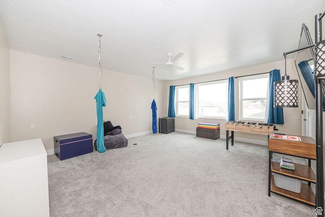 1959 E Deer Crest Cir N, Logan, UT 84341 - rec room featuring ceiling fan, baseboards, and carpet