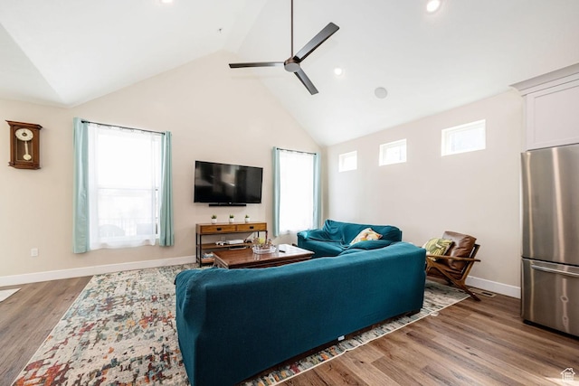 1959 E Deer Crest Cir N, Logan, UT 84341 - living room featuring a healthy amount of sunlight, baseboards, ceiling fan, and wood finished floors
