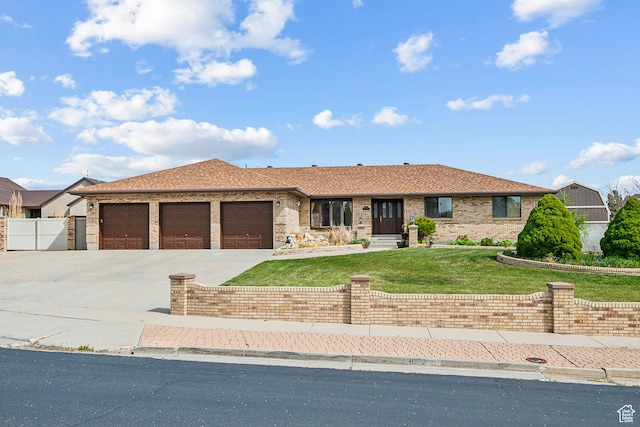 3902 W Angus Dr, South Jordan, UT 84009 - ranch-style house with concrete driveway, an attached garage, brick siding, and roof with shingles
