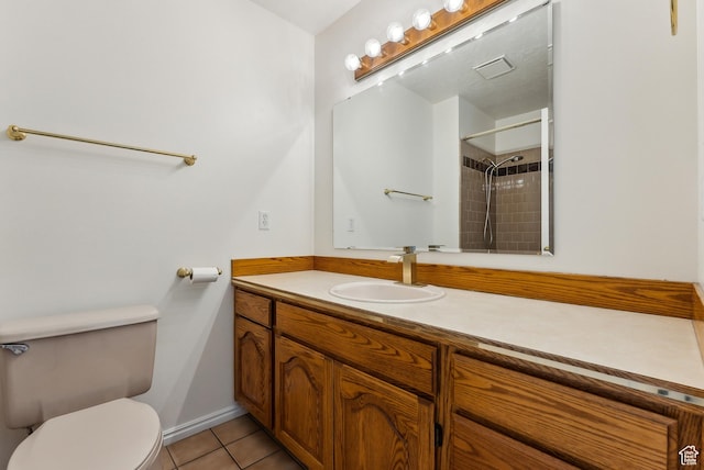 3902 W Angus Dr, South Jordan, UT 84009 - full bath with tile patterned flooring, toilet, vanity, baseboards, and a shower