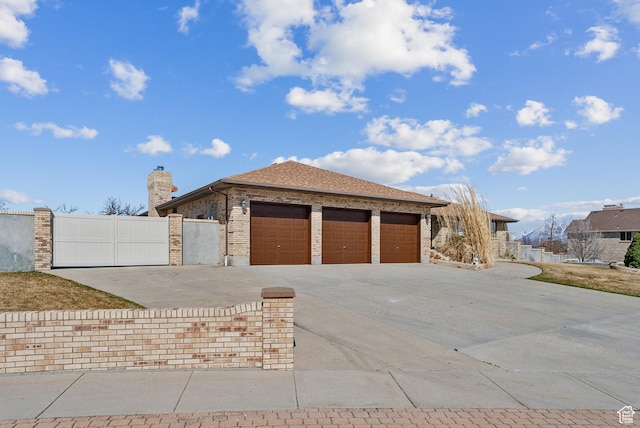 3902 W Angus Dr, South Jordan, UT 84009 - view of front facade featuring driveway, a garage, fence, a gate, and a chimney
