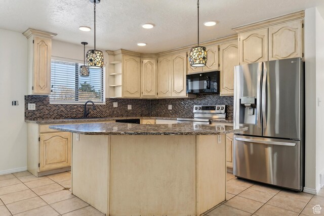 3902 W Angus Dr, South Jordan, UT 84009 - kitchen with stainless steel appliances, a sink, light tile patterned flooring, baseboards, and recessed lighting