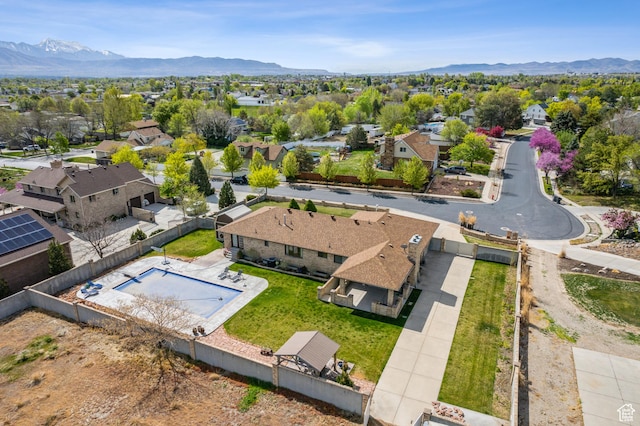 3902 W Angus Dr, South Jordan, UT 84009 - aerial perspective of suburban area featuring a mountain backdrop and a pool area