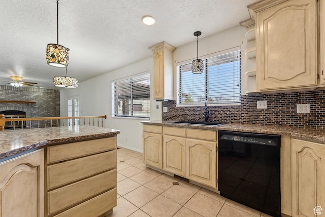 3902 W Angus Dr, South Jordan, UT 84009 - kitchen featuring dishwasher, light brown cabinetry, a sink, healthy amount of natural light, and a textured ceiling