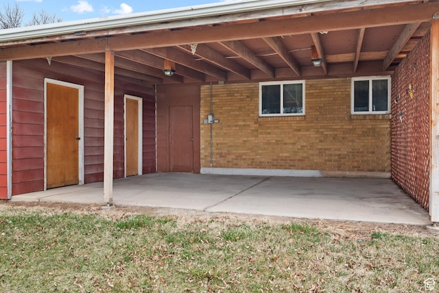 view of patio / terrace with a carport