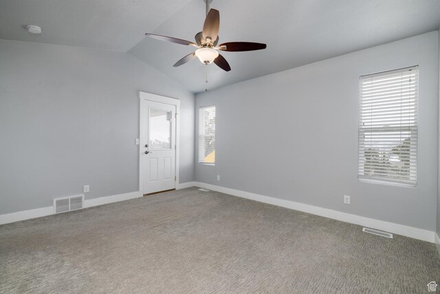 46501 W Bandanna Dr, Fruitland, UT 84027 - carpeted spare room with visible vents, lofted ceiling, baseboards, and ceiling fan
