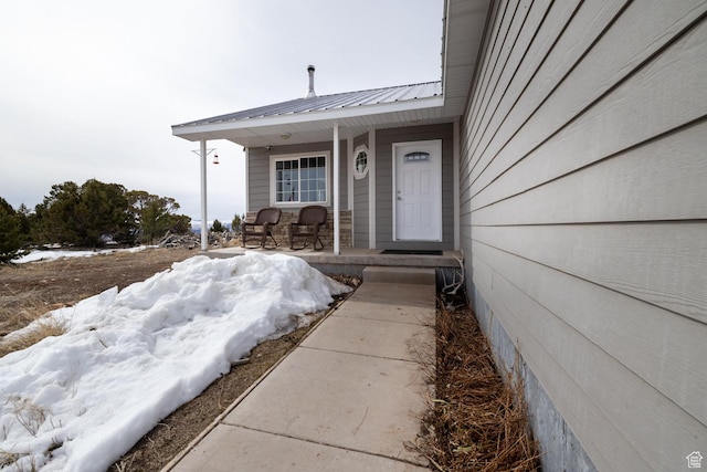 46501 W Bandanna Dr, Fruitland, UT 84027 - property entrance featuring metal roof and covered porch