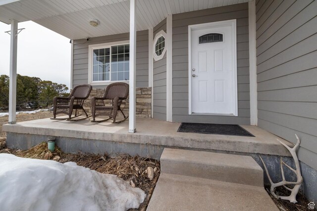 46501 W Bandanna Dr, Fruitland, UT 84027 - doorway to property with a porch and stone siding