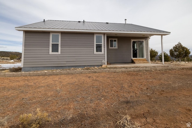 46501 W Bandanna Dr, Fruitland, UT 84027 - back of property featuring entry steps and metal roof