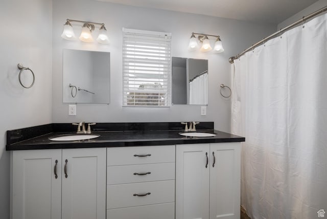 46501 W Bandanna Dr, Fruitland, UT 84027 - bathroom featuring a sink and double vanity