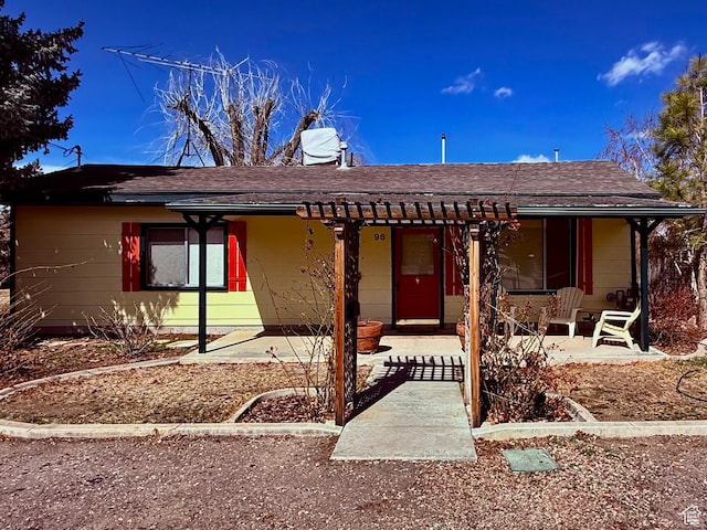 82 W 500 N, Vernal, UT 84078 - ranch-style house with a shingled roof and a patio area