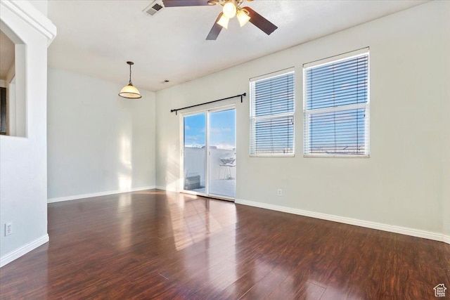 173 E Irisfield Dr S, Draper, UT 84020 - spare room featuring ceiling fan, wood finished floors, baseboards, and arched walkways