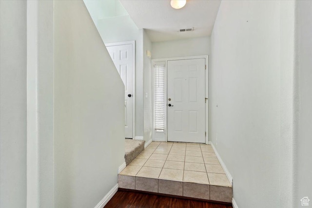 173 E Irisfield Dr S, Draper, UT 84020 - doorway with baseboards and tile patterned flooring