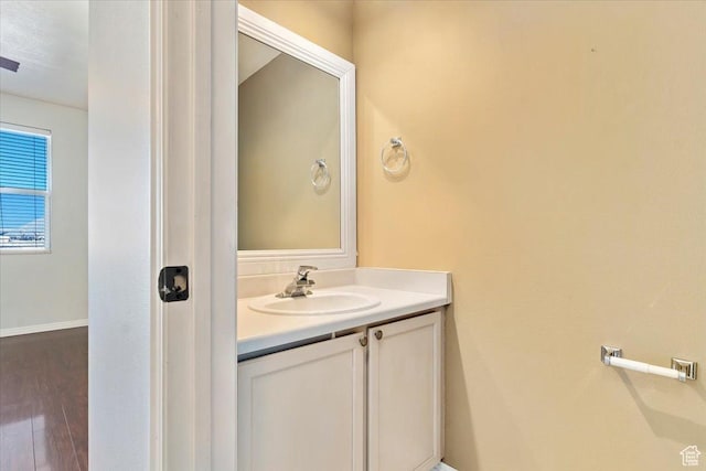 173 E Irisfield Dr S, Draper, UT 84020 - bathroom with vanity, wood finished floors, and baseboards