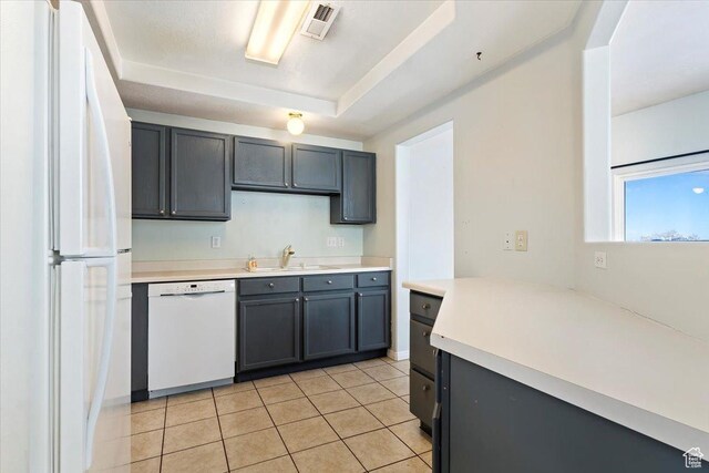 173 E Irisfield Dr S, Draper, UT 84020 - kitchen featuring white appliances, a sink, light tile patterned flooring, light countertops, and gray cabinets