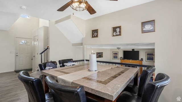 5254 W Ted Way, West Valley City, UT 84120 - dining room featuring wood finished floors, a ceiling fan, and baseboards