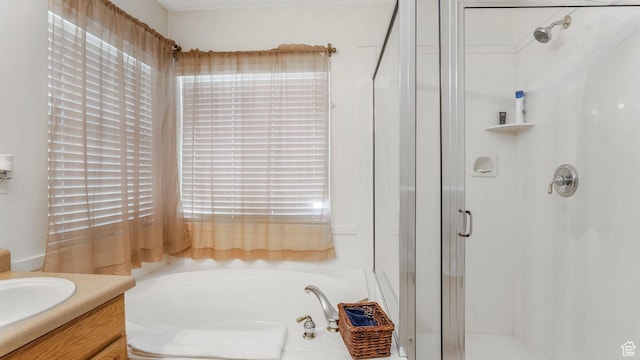 5254 W Ted Way, West Valley City, UT 84120 - bathroom with vanity, a garden tub, and a shower stall