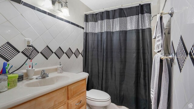 5254 W Ted Way, West Valley City, UT 84120 - full bathroom featuring a shower with shower curtain, toilet, tile walls, and vanity