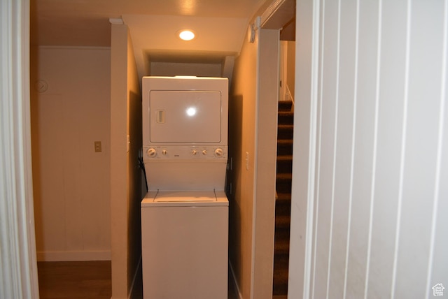 4023 W Severn Cir S, Jordan, UT 84009 - laundry area featuring stacked washer / dryer, baseboards, wood finished floors, and recessed lighting