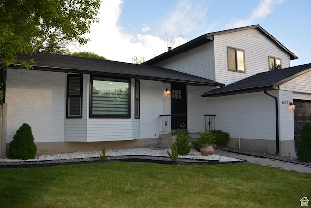 4023 W Severn Cir S, Jordan, UT 84009 - view of front of property with brick siding and a front lawn