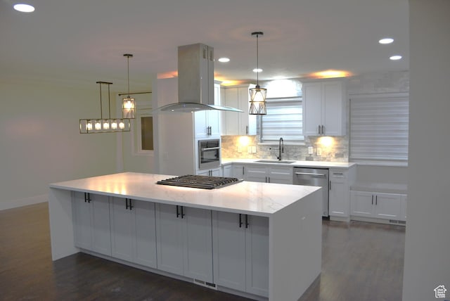 4023 W Severn Cir S, Jordan, UT 84009 - kitchen featuring island exhaust hood, appliances with stainless steel finishes, a sink, decorative backsplash, and dark wood-type flooring