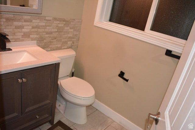 4023 W Severn Cir S, Jordan, UT 84009 - half bath featuring toilet, tasteful backsplash, vanity, tile patterned floors, and baseboards