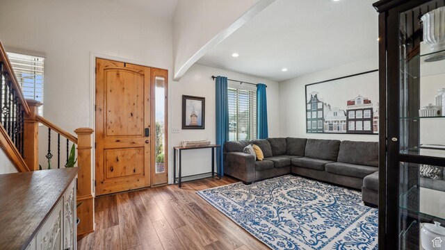 125 N 1430 E, Spanish Fork, UT 84660 - living area featuring wood finished floors, stairs, recessed lighting, and arched walkways