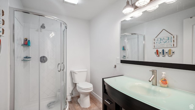 125 N 1430 E, Spanish Fork, UT 84660 - full bath featuring wood finished floors, toilet, a stall shower, vanity, and baseboards