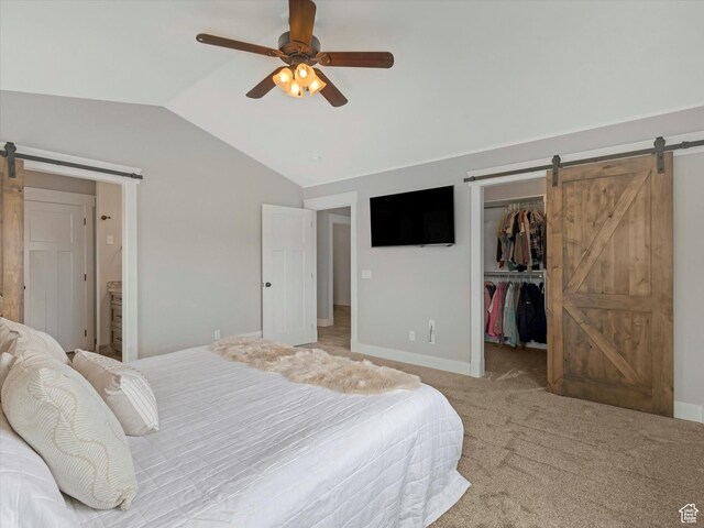 361 W 200 N, Heber City, UT 84032 - bedroom with a barn door, vaulted ceiling, a spacious closet, light colored carpet, and a closet