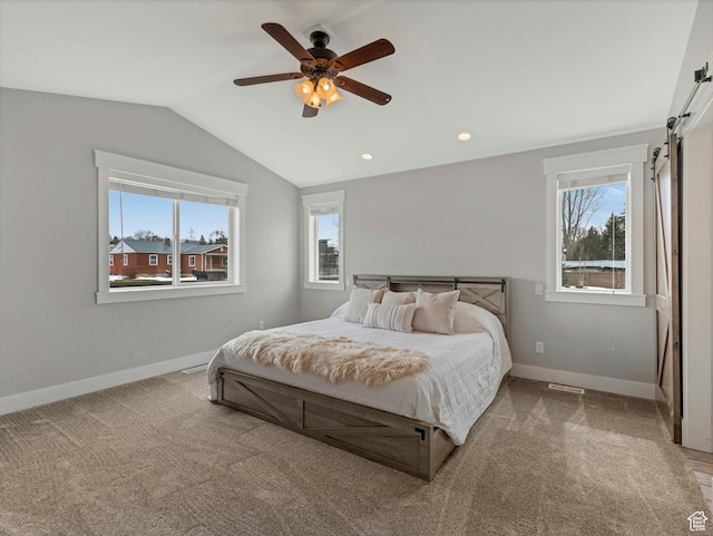 361 W 200 N, Heber City, UT 84032 - bedroom featuring lofted ceiling, a barn door, baseboards, carpet floors, and a ceiling fan