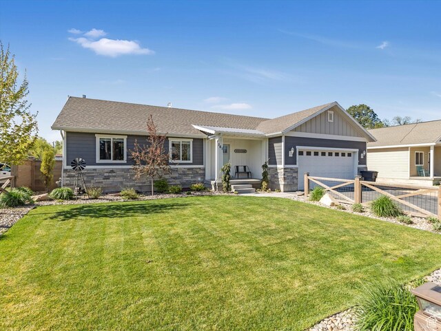 361 W 200 N, Heber City, UT 84032 - ranch-style home featuring stone siding, a garage, roof with shingles, board and batten siding, and driveway