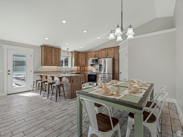 361 W 200 N, Heber City, UT 84032 - dining room with vaulted ceiling, a chandelier, light wood-type flooring, baseboards, and recessed lighting