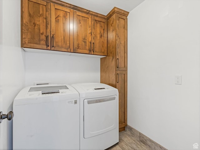 361 W 200 N, Heber City, UT 84032 - laundry area with washing machine and dryer, cabinet space, and light wood-style flooring