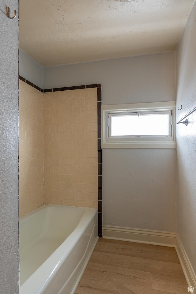 33 N 200 E, Logan, UT 84321 - full bathroom featuring baseboards and wood finished floors