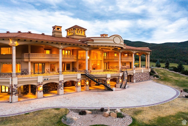 8272 Left Fork Hobble Creek Rd, Springville, UT 84663 - back of property with a tile roof, a mountain view, and a chimney