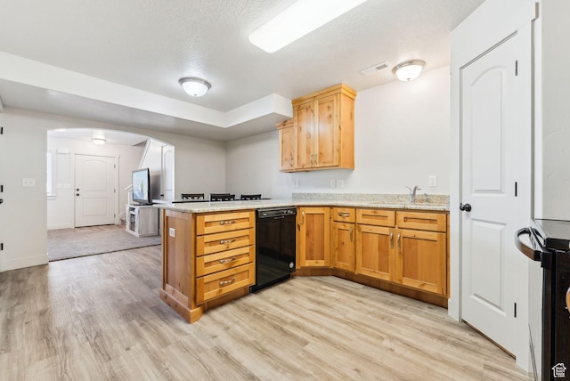 kitchen featuring light stone countertops, a peninsula, arched walkways, light wood-style floors, and dishwasher