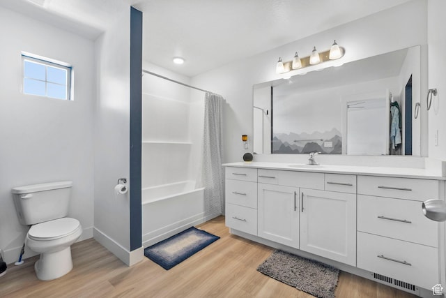 899 N 1330 E, Spanish Fork, UT 84660 - bathroom with toilet, vanity, baseboards, and wood finished floors