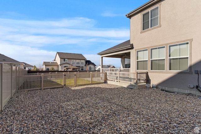 1251 N 2525 W, Clinton, UT 84015 - view of yard featuring a fenced backyard and a residential view