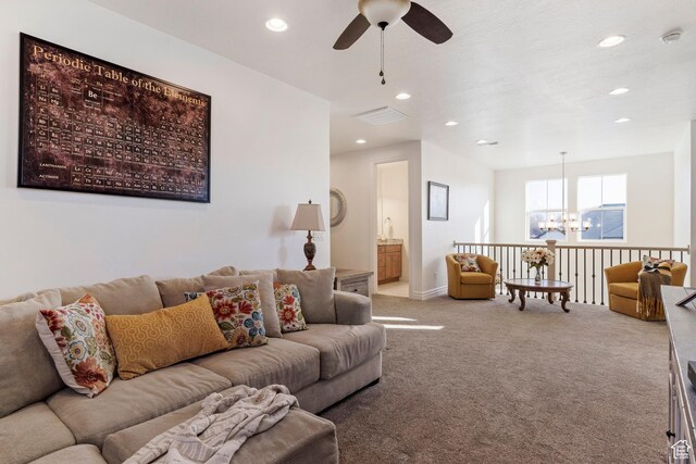 1251 N 2525 W, Clinton, UT 84015 - carpeted living room with recessed lighting, ceiling fan with notable chandelier, visible vents, and baseboards
