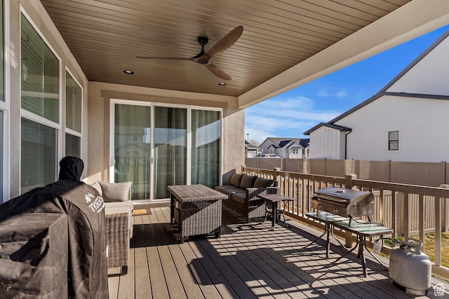 1251 N 2525 W, Clinton, UT 84015 - wooden deck with a ceiling fan, fence, area for grilling, a residential view, and an outdoor hangout area