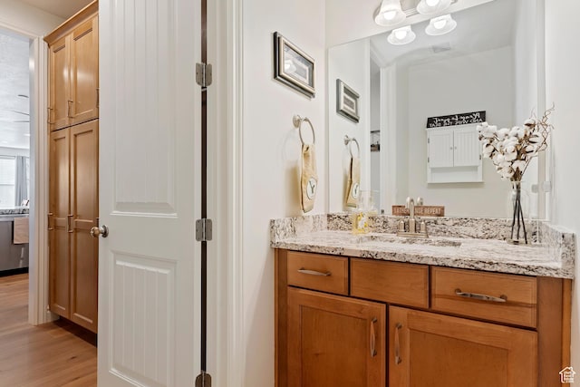 1251 N 2525 W, Clinton, UT 84015 - bathroom with vanity and wood finished floors