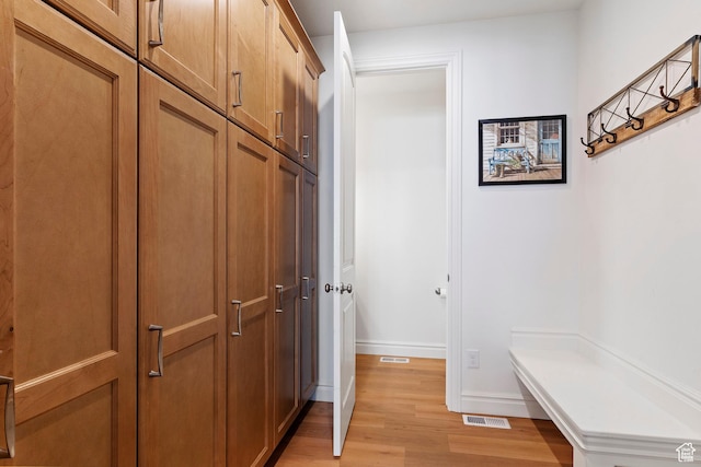 1251 N 2525 W, Clinton, UT 84015 - hallway with light wood-style flooring, baseboards, and visible vents