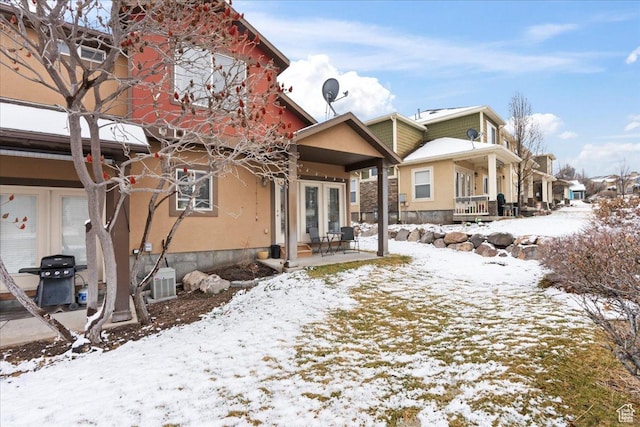 14488 S Stone Stream St W, Herriman, UT 84096 - snow covered house with french doors