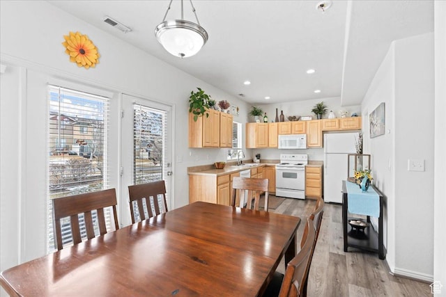 14488 S Stone Stream St W, Herriman, UT 84096 - dining area featuring light wood finished floors, visible vents, recessed lighting, and baseboards