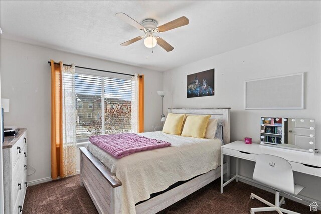 14488 S Stone Stream St W, Herriman, UT 84096 - bedroom with dark carpet, baseboards, and a ceiling fan