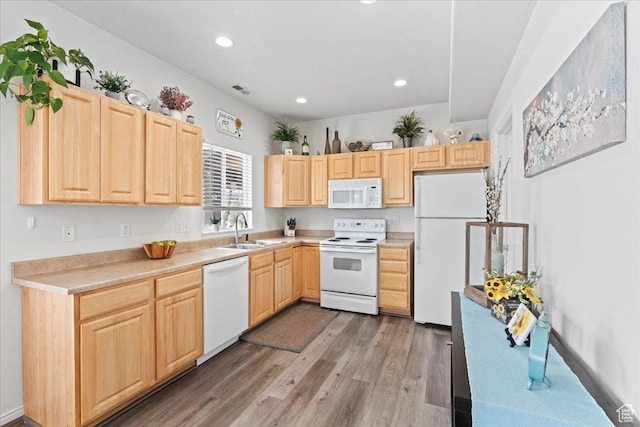14488 S Stone Stream St W, Herriman, UT 84096 - kitchen with white appliances, light brown cabinets, light wood-style flooring, a sink, and light countertops