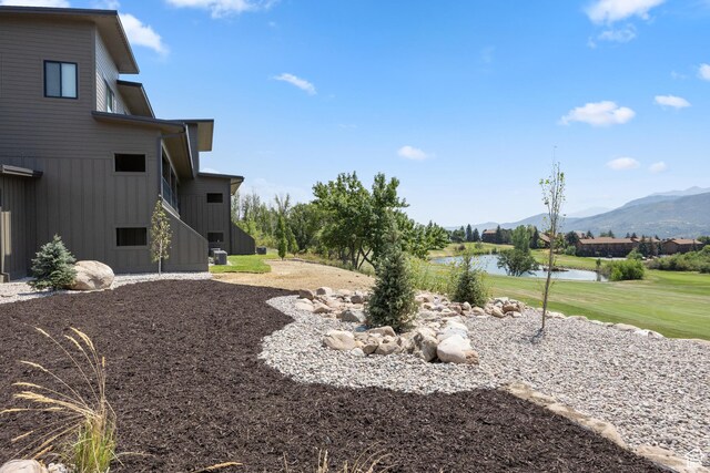 3884 N 4975 E Unit B207, Eden, UT 84310 - view of yard featuring golf course view and a water and mountain view