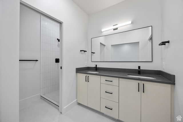 3884 N 4975 E Unit B207, Eden, UT 84310 - full bath with baseboards, a sink, double vanity, and tiled shower